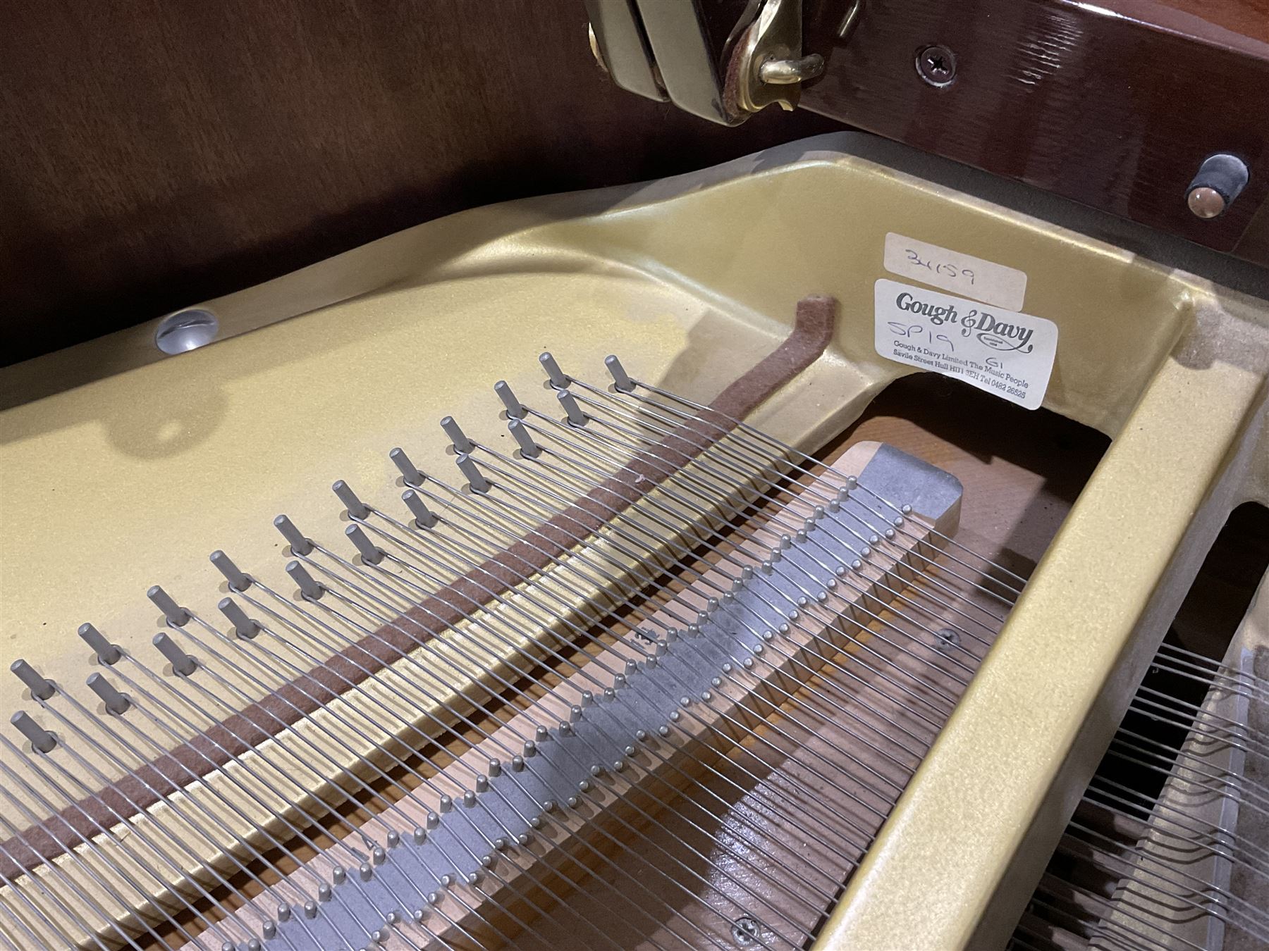 Yamaha - Baby Grand piano in mahogany polyester finish case,  G1 model, serial No 4741647, cast overstrung frame with 88 keys and seven octave compass, original stringing, tuning pins, hammers, dampers and felts, sostenuto, una corda and sustain pedals, with a solid music desk and tapered legs on brass castors.   