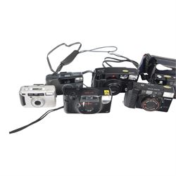 Collection of cameras including two Minolta AF-E, Pentax Zoom 90, Samsung AF 200, Pentax Espio 120Mi, Yashica Microtec Zoom 70, Canon Sure Shot and Minolta Riva Zoom 140 EX