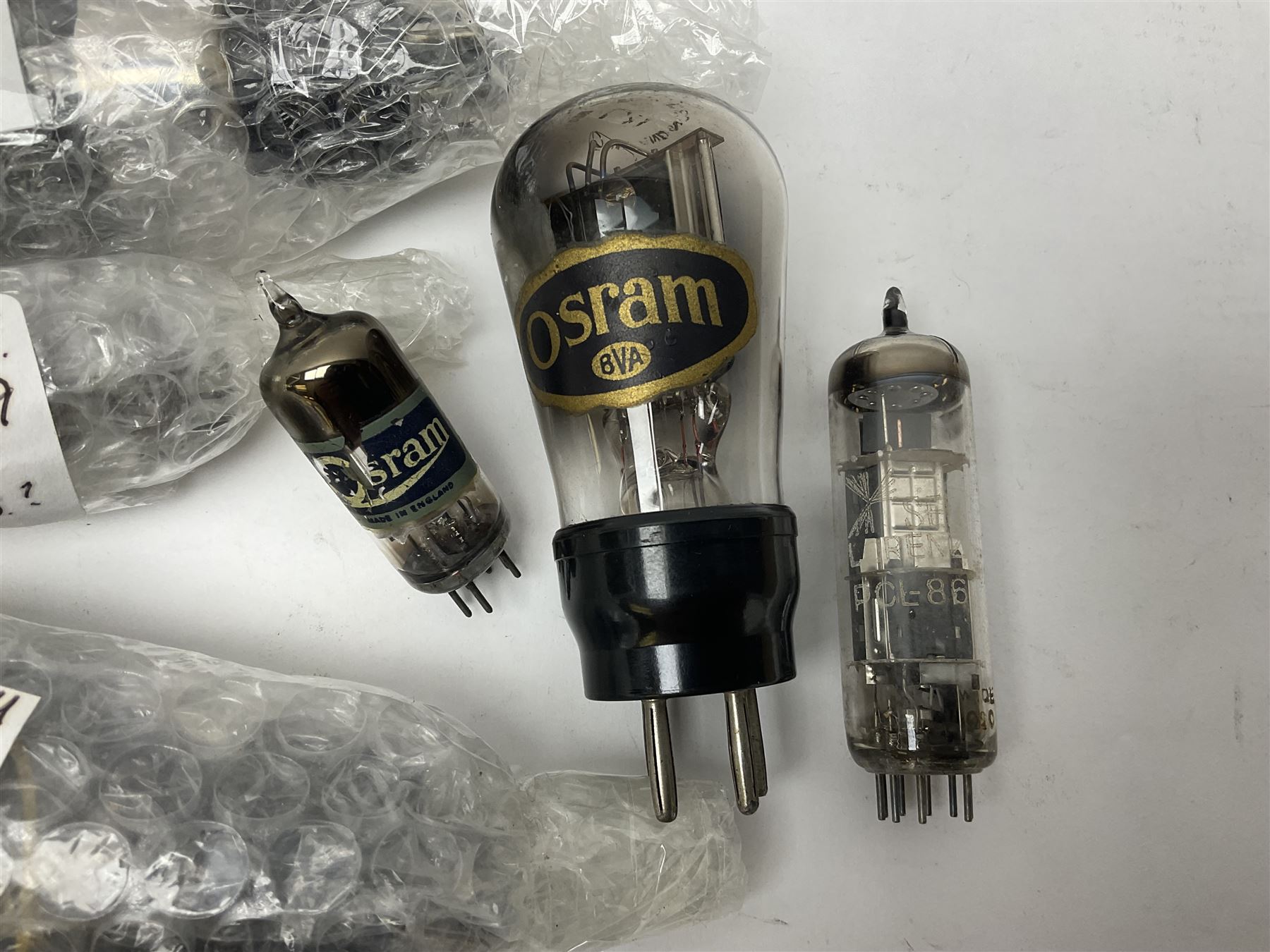 Collection of Osram, Elpico, Sylvania and similar thermionic radio valves/vacuum tubes, including P2, L21, DH77 GK9, U14 and PCLl86, approximately 19 as per list, unboxed