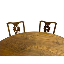 David Shackleton of Snainton - circular figured elm dining table, turned pedestal column on three splayed supports; together with a set of eight dining chairs, shaped cresting rail over shaped and pierced splat, upholstered drop in seat, on square supports united by stretchers 
