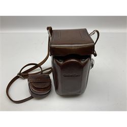 Franke & Heidecke Synchro-Compur Rolleiflex camera, twin lens camera, serial number 2447615, with viewing lens '1:2.8/80 Heidosmat No. 857174', Taking Lens '1:2.8/80 Carl Zeiss Planar No. 4189283', in leather case