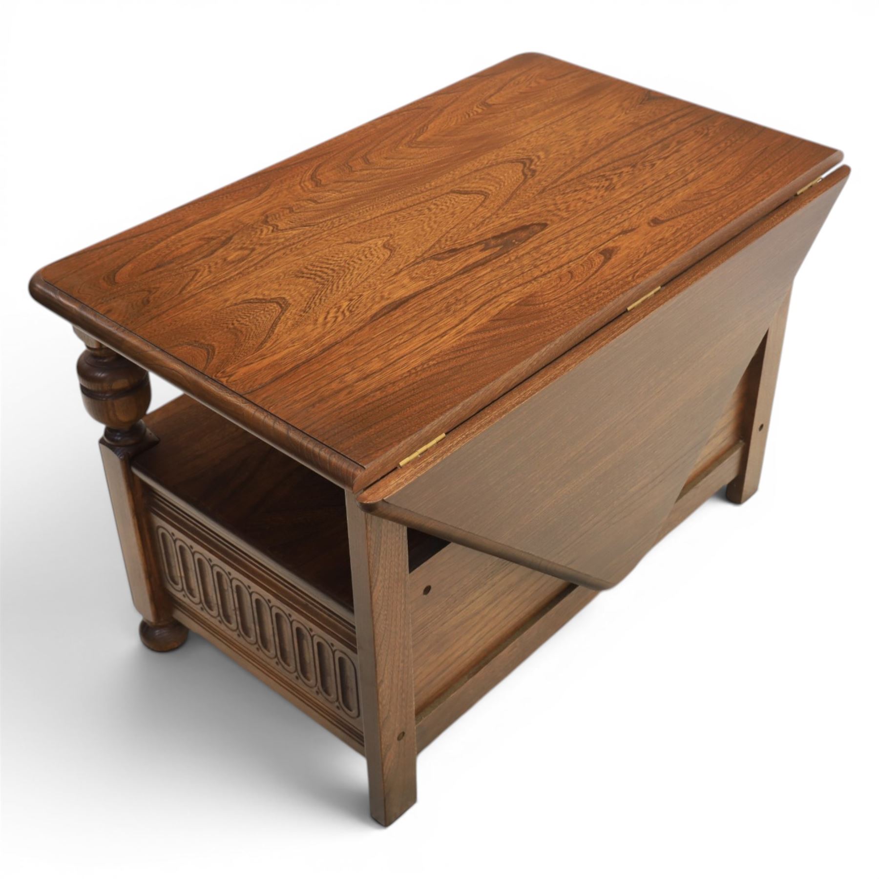 Ercol -  dark elm corner TV stand and coffee table, TV stand with drop triangular leaf, over open recess above a single drawer (H 47cm, D 44cm with leaf 79cm, W 73cm,  the coffee table with chamfered rectangular top with full length undertier, raised on turned supports (H 43cm, D 54cm, W 115cm) 