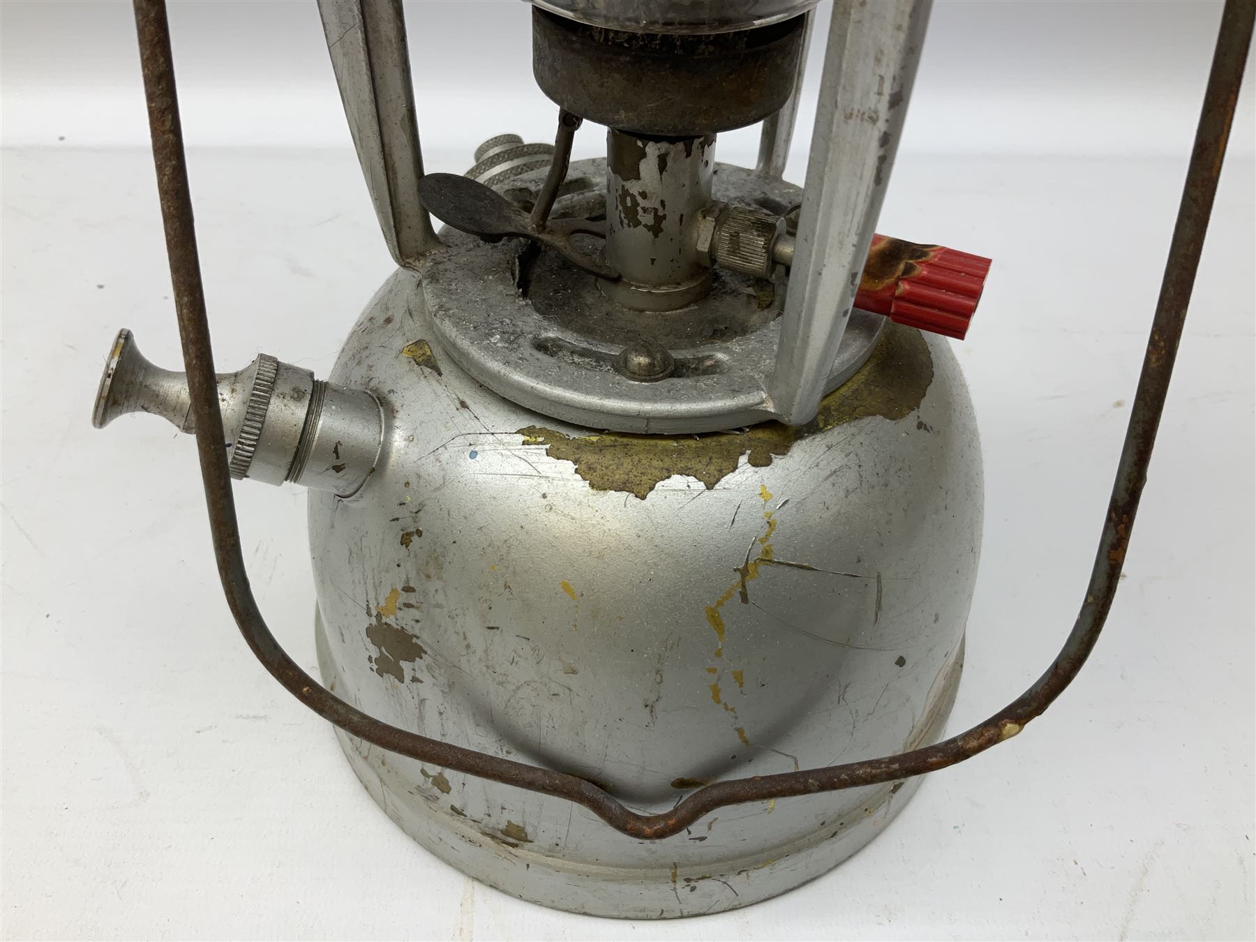 Copper and brass ship’s lamp marked ‘Anchor’, H25cm, Feuer hand storm lantern, Bialaddin Model 315 paraffin lamp and an Anchor lamp (4)