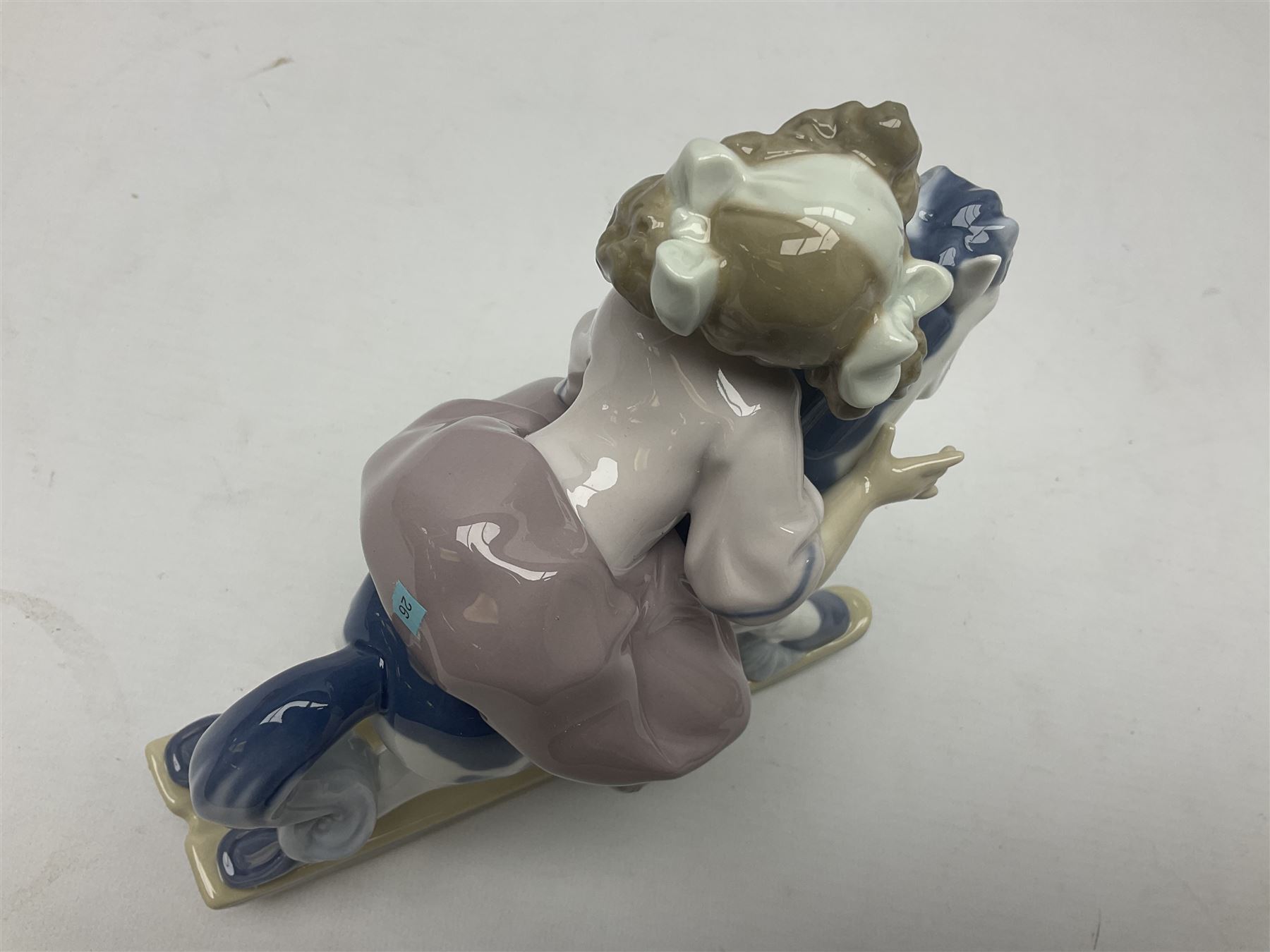 Three Lladro figures, Faithful Steed no 5769, Best Foot Forward no 5738 and Lambkins no 5469, all with original boxes, largest example H21cm 