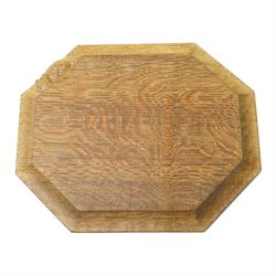 Mouseman - oak chopping board, of canted octagonal form, with carved mouse signature, by t...