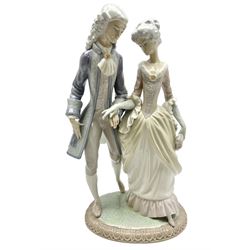 Lladro figure, Walk in Versailles, modelled as a man and woman in period dress, sculpted by Vincente Martinez, no 5004, year issued 1978, year retired 1981, H40cm 