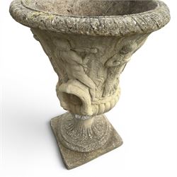 Greek design cast stone garden centre-piece urn, decorated with figures and loop handles, raised on squat pedestal, square base