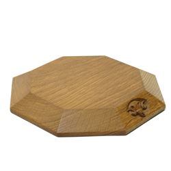 Ramman - oak teapot or plant stand, of octagonal form with chamfered edge, with carved ram head signature, by Terry Harrington of Leyburn