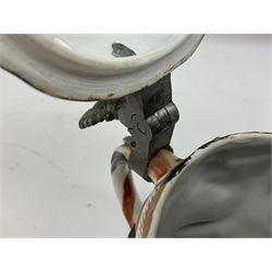 Otto Von Bismarck figural 0.5l stein, his black pickelhaube helmet with chrome spike serving as the lid, in green uniform and gilt detail throughout, pewter thumb hinge, with blue hash Musterschutz type mark, H18cm