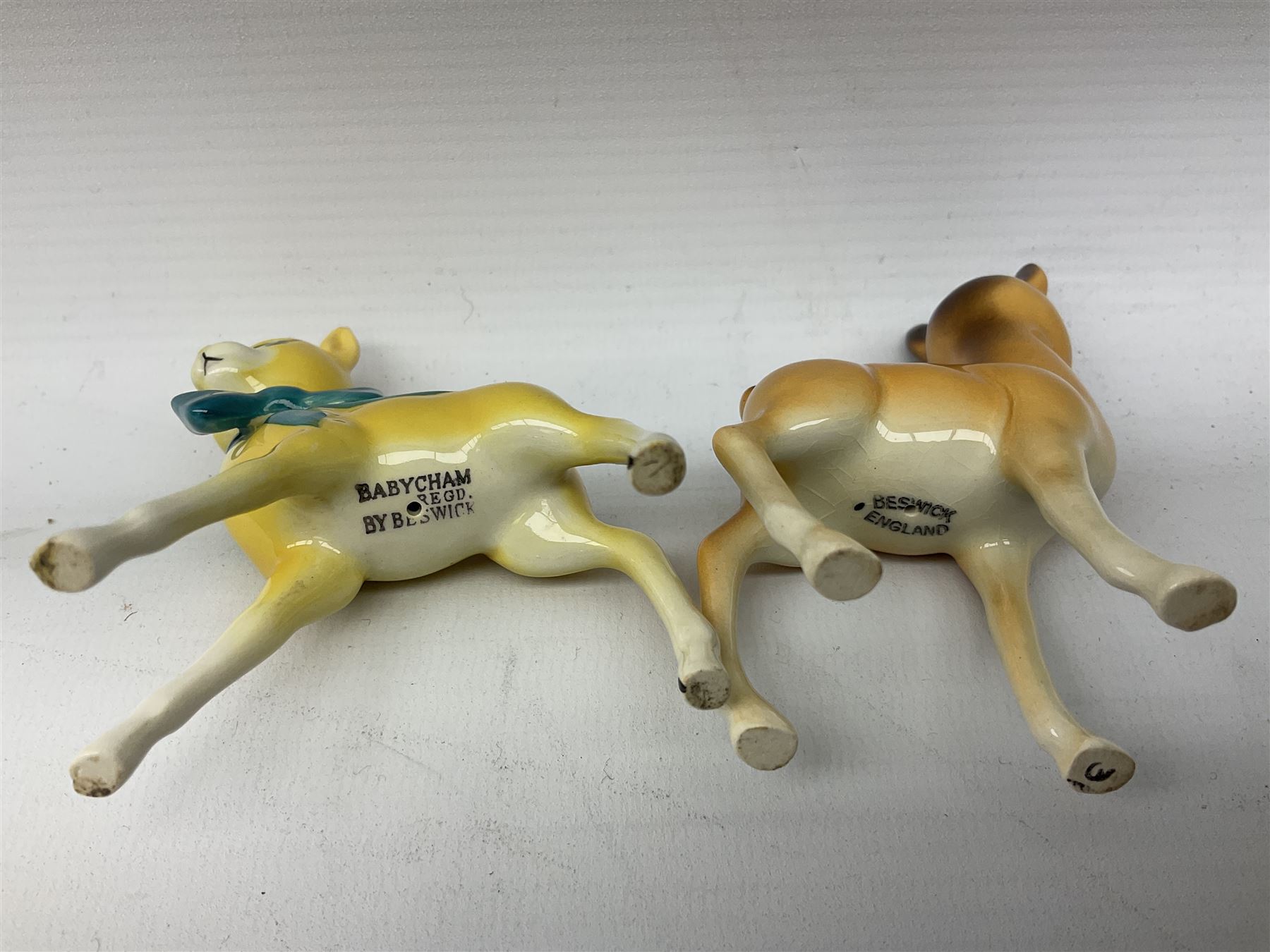 Collection of Beswick figures to include Beatrix Potter Squirrel Nutkin, Jemima Puddleduck, Spike and Tyke, Tom and Jerry, both boxed and with certificates, Chamois 1551 and Babycham 1615a (a/f) Beswick Ware Royal Douton Peter Rabbit and Benjamin Bunny, with certificate
(9)
