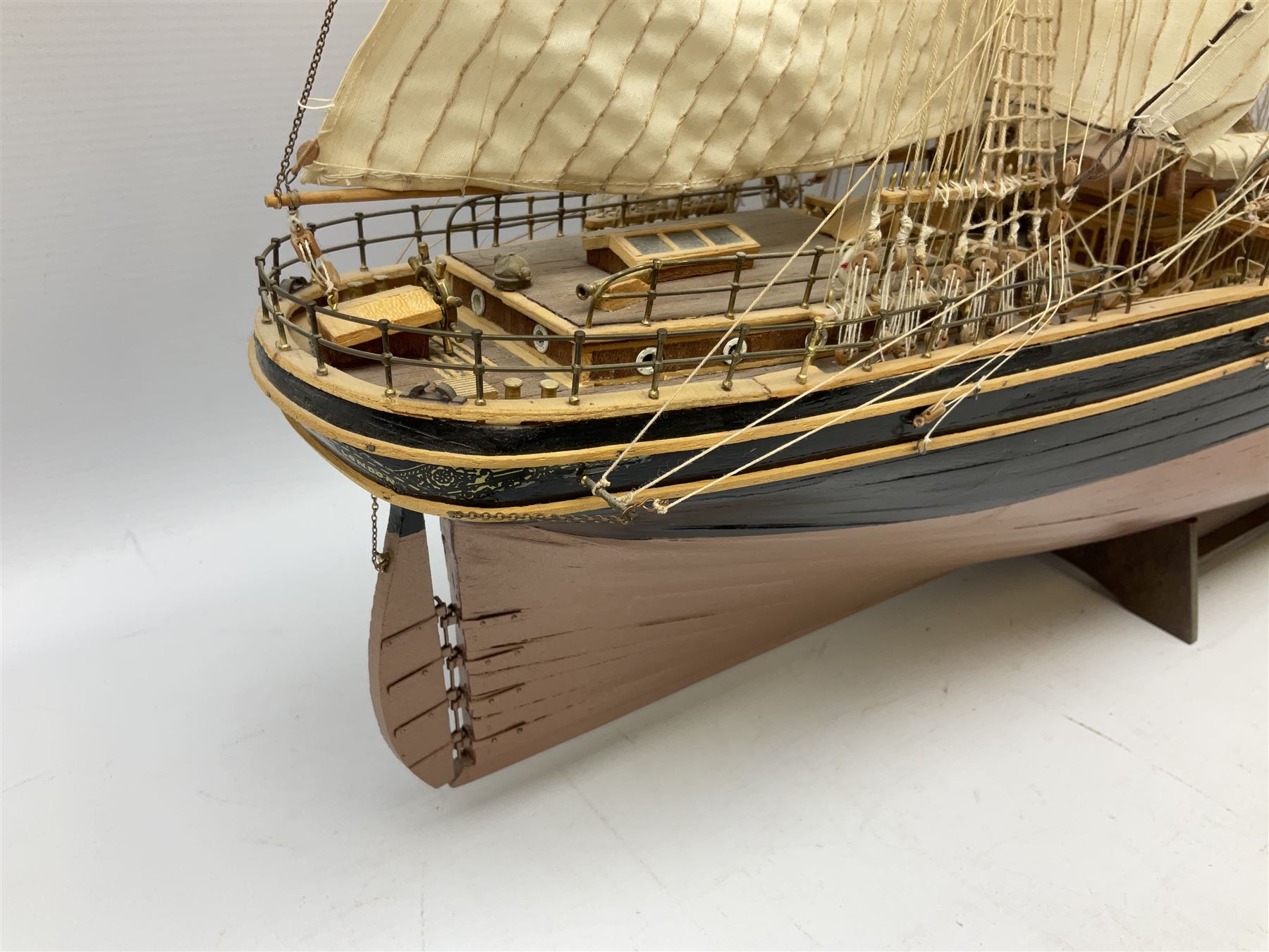 Three masted kit built sailing ship with cloth sales, deck fittings and full rigging, on open display, L110cm, H80cm  