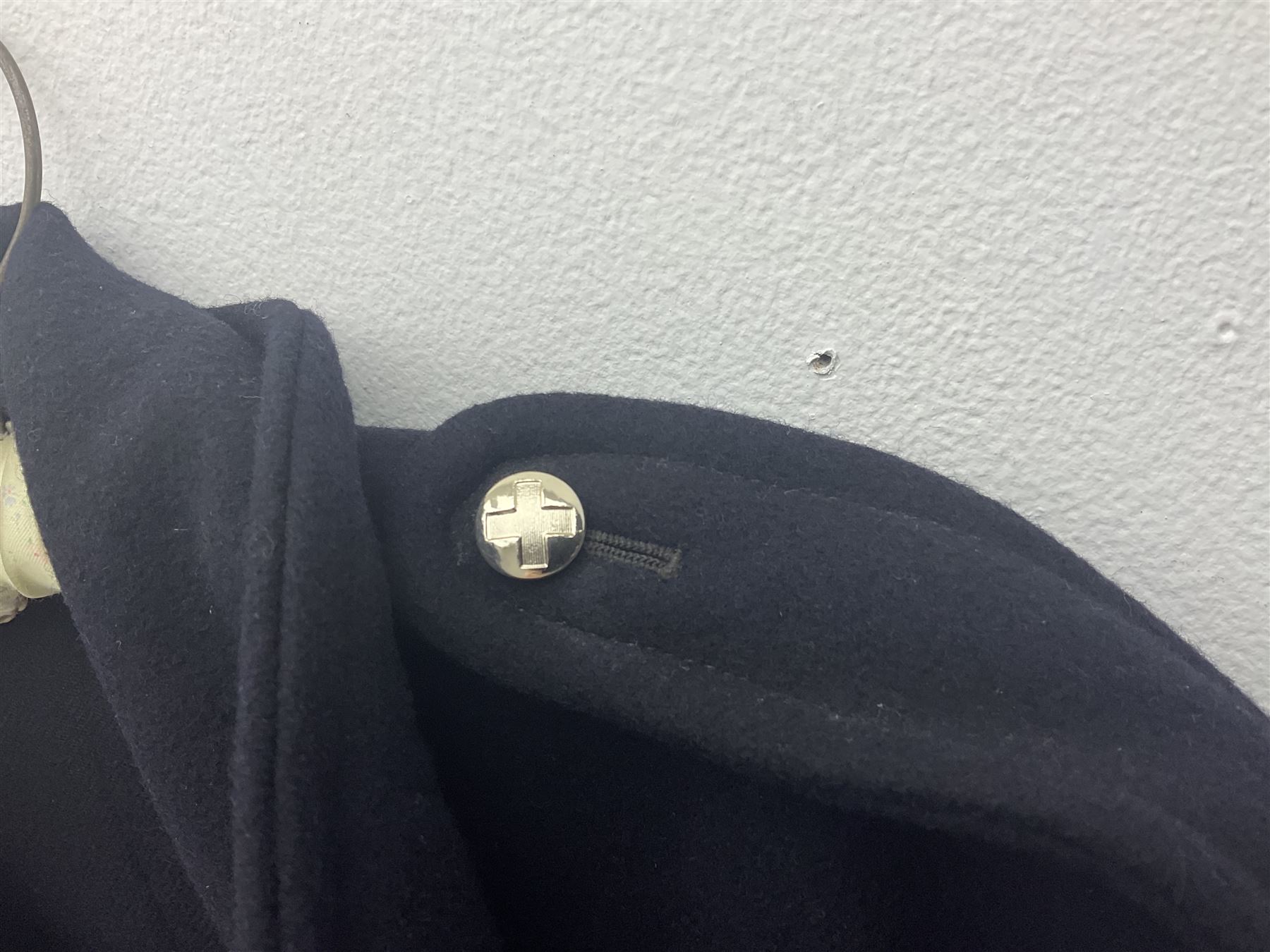 1950s British Red Cross North Yorkshire dress uniform comprising tunic, trousers, greatcoat and visor cap; bears manuscript label '1956 Ware'