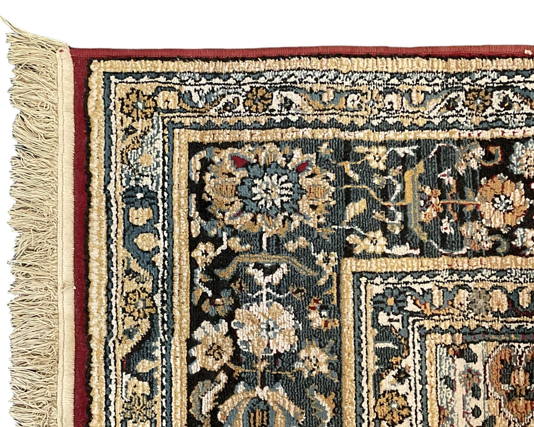 Persian design rug, rectangular crimson ground field with medallion, surrounded by trailing foliate branches, within wide border bands decorated with stylised floral motifs 