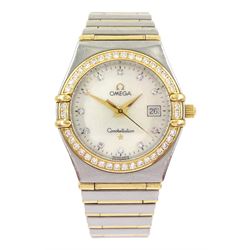 Omega Constellation ladies gold and stainless steel quartz wristwatch, Ref. 796.1201, mother of pearl dial, with diamond dot hour markers and diamond bezel, on Omega gold and stainless steel bracelet, with fold-over clasp