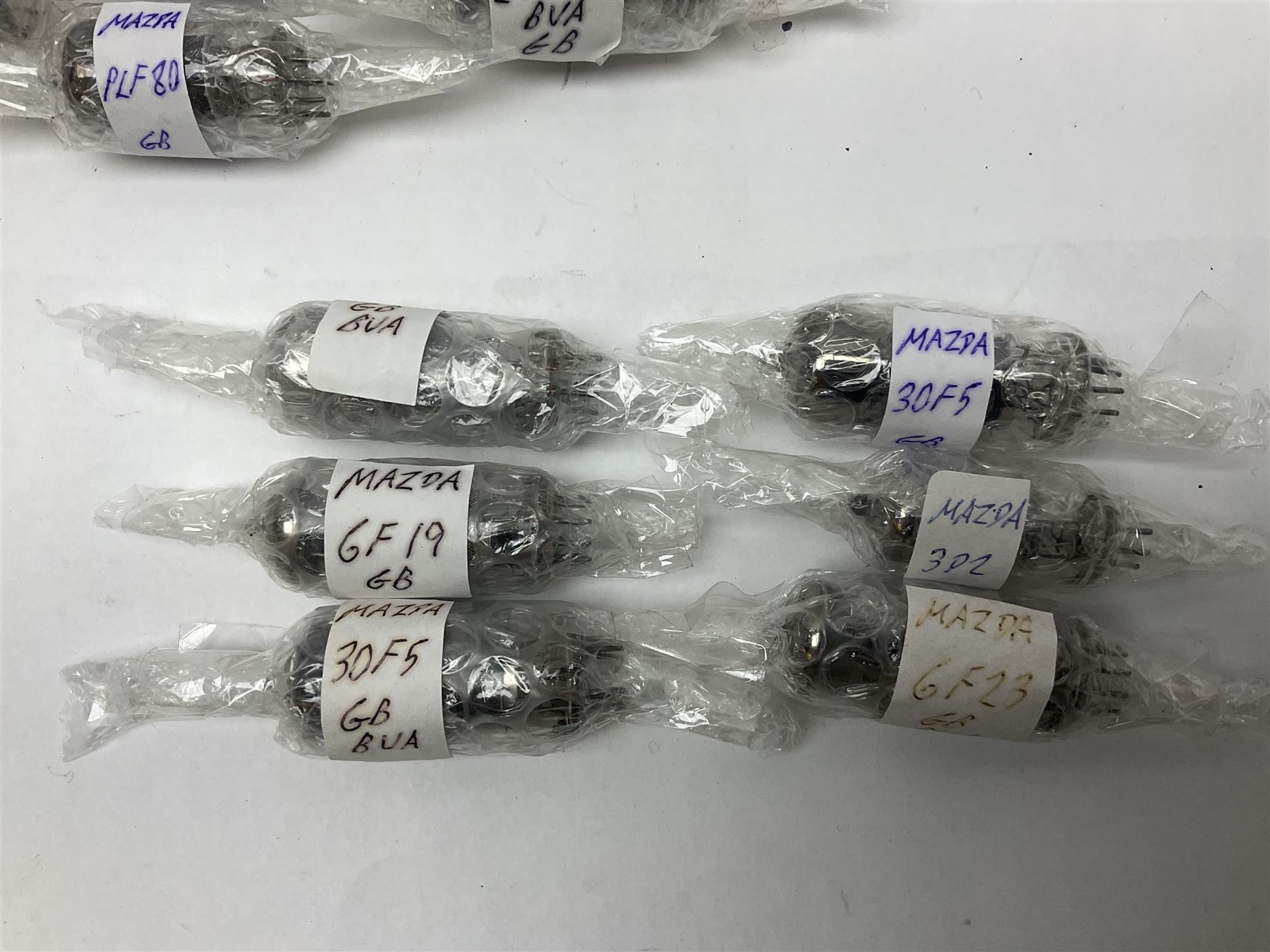 Collection of Mazda thermionic radio valves/vacuum tubes, including EH90, U26, PCF84, U26 approximately 55