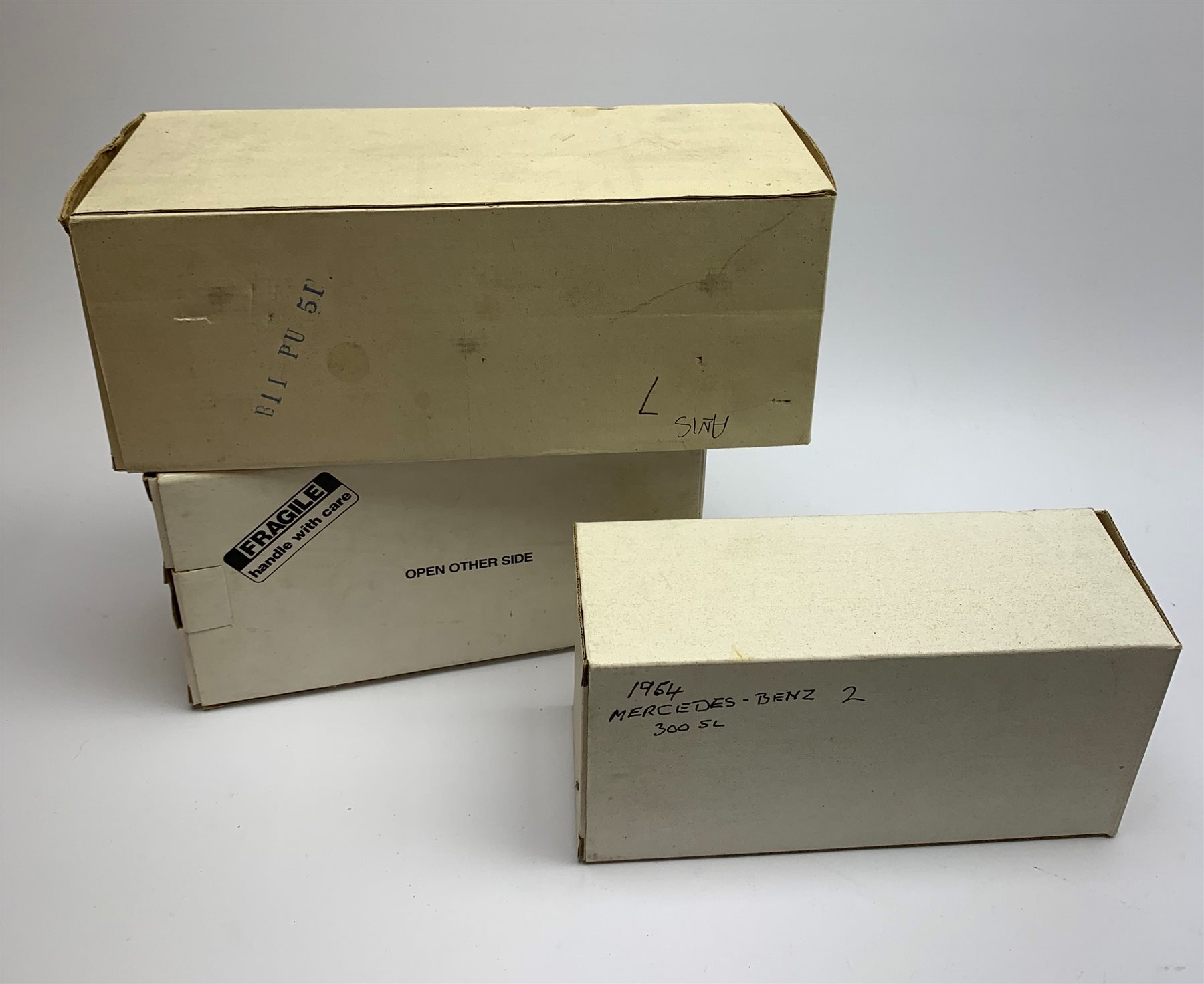 Two Franklin Mint die-cast models comprising 1938 Alvis 4.3 litre and 1954 Mercedes Benz 300SL, both boxed with paperwork; together with a Danbury Mint die-cast model of a 1949 Jaguar XK120, boxed (3)