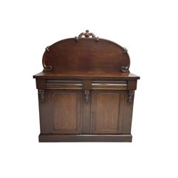 Victorian mahogany chiffonier sideboard, raised back with central cartouche pediment, fitted with two two drawers over two panelled cupboards, flanked by foliate corbels