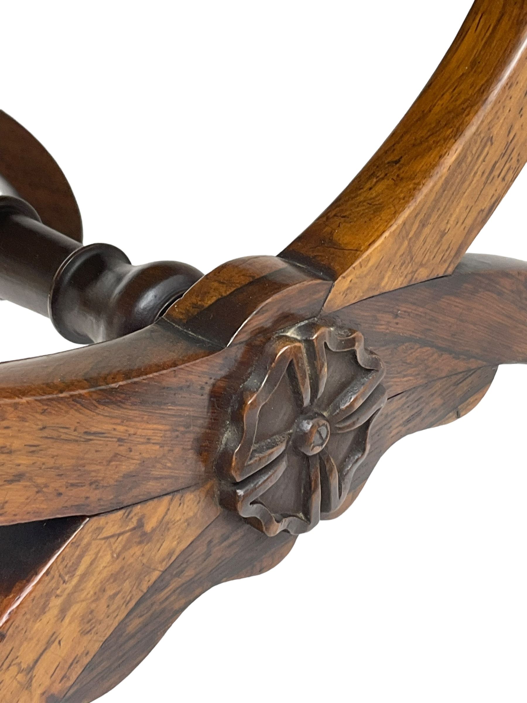 20th century mahogany rectangular footstool, needlework upholstered drop-in seat, on ball and claw carved feet (W81cm, D35cm, H34cm); 19th century elm stool, needlework upholstered drop-in seat, on square moulded supports united by plain stretchers (W45cm); 19th century walnut stool, shaped top upholstered in needlework, on cabriole supports (W50cm); 19th century rosewood stool, upholstered drop-in seat, on curved x-framed supports united by turned stretcher (W47cm)