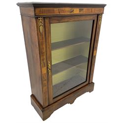 Victorian walnut pier cabinet, moulded rectangular top over inlaid frieze and uprights, enclosing by single glazed door, the interior fitted with two shelves, on shaped bracketed plinth base