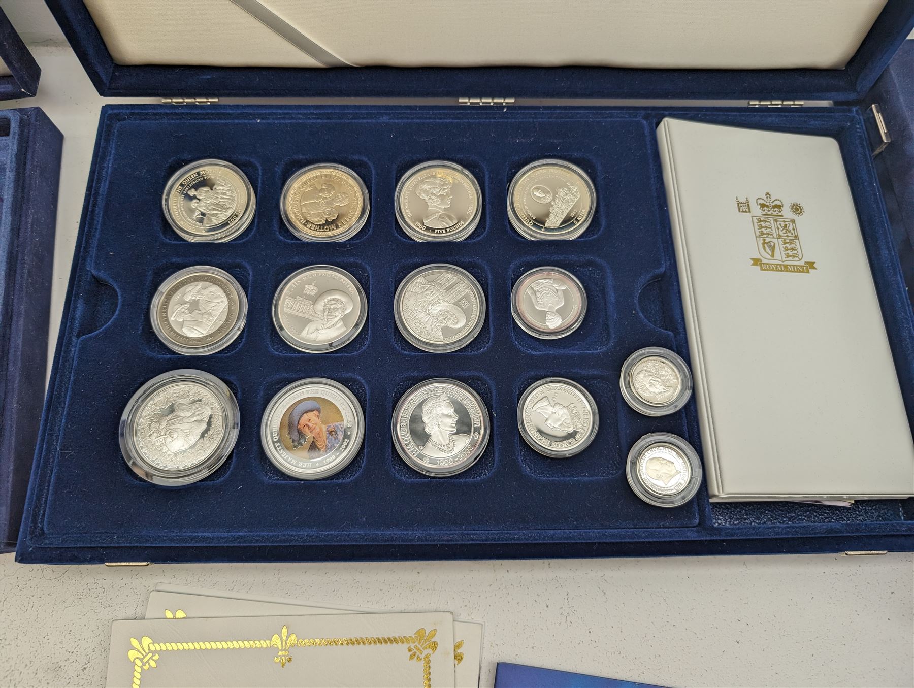 Large collection of modern commemorative coins, mostly being silver proof, including Queen Elizabeth II Bailiwick of Guernsey 1999 'Sir Winston Churchill' one pound, 2000 'HM Queen Elizabeth The Queen Mother', various sterling silver proof coins from the 'Golden Wedding Anniversary Silver Collection' including Bailiwick of Guernsey 1997 five pounds, Bermuda 1997 two dollars, Republic of Malawi 1997 five kwacha, Falkland Islands 1997 five pounds, Bailiwick of Jersey 1997 five pounds, Alderney 1997 two pounds etc, various sterling silver proof and portrait highlighted in gold coins from the 'Golden Jubilee Collection' including Cayman Islands 2002 two dollars, Bailiwick of Guernsey 2003 five pounds etc, housed in various coin displays or cases, mostly with certificates