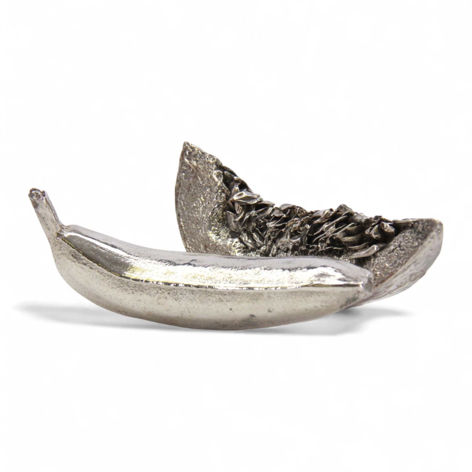 Two modern silver novelty filled models of fruit, the first example modelled as a segment of melon, L16cm, the second as a banana, L14.5cm, each hallmarked John Bull Ltd, Birmingham, no visible date letter, also stamped filled