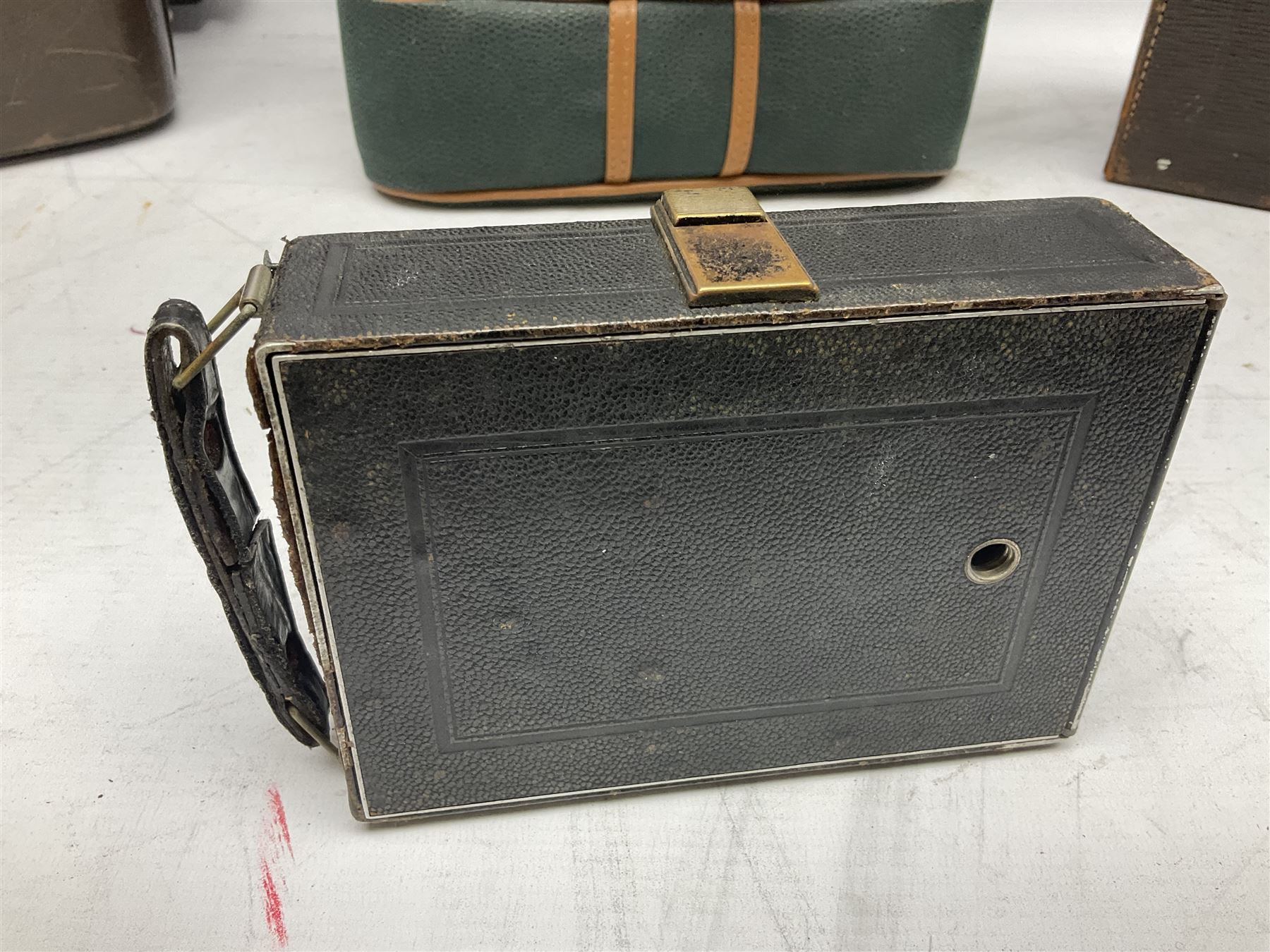 Miranda Sensorex camera body, Miranda Sensorex II camera body with 'Auto Miranda 1:1.8 f-59mm' lens, 'Auto Miranda 1:2.8 f-135mm' lens, 'Auto Miranda 1:3.5 f-200mm' lens, 'Auto Miranda 1:2.8 f-28mm' len, Agfa plate camera with 9cm x 12cm plates and other camera equipment including Miranda camera bag