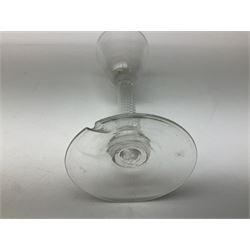 18th century drinking glass, the funnel bowl raised upon a single series air twist stem and conical foot, H16.5cm
