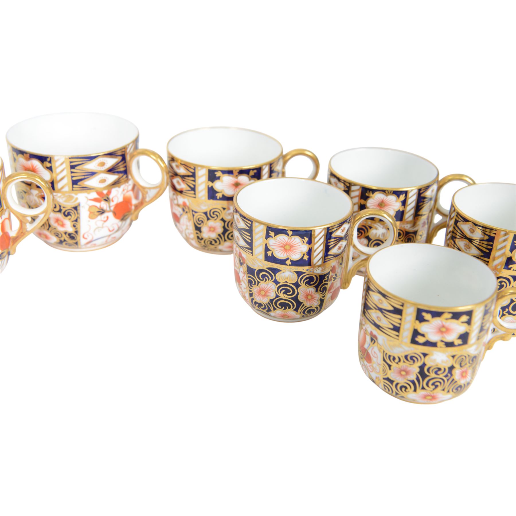 Royal Crown Derby Imari 2451 pattern, cups and saucers of various sizes, comprising ten cups and nine saucers  