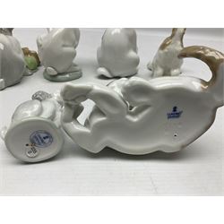 Six Lladro figures, comprising A Friend for Life no 7685, Rabbit Eating no 4773, Sitting Bunny no 5907, Washing up no 5887, Surprised cat no 5114 and Scar-dy Cat no 5092, all with original boxes, largest example H15cm 