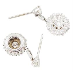 Pair of 18ct white gold diamond cluster pendant stud earrings, cluster of round brilliant cut diamonds, suspending from a single baguette cut diamond a further round brilliant cut diamond, total diamond weight approx 1.70 carat