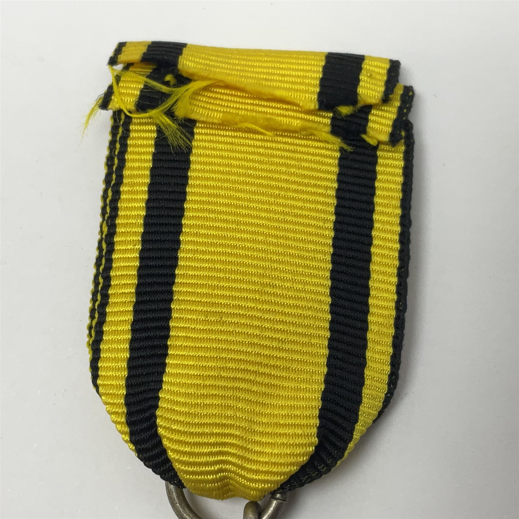 WWII German Iron Cross 2nd Class with ribbon; WWI German Wuerttemberg Medal with ribbon; and Day Badge for 1934 marked Reichsverband Pforzheim32 (3)