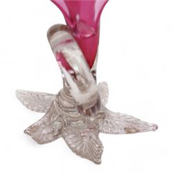 Early 20th century Bohemian cranberry glass flower form plate, overlaid with opaque and hand painted and gilded with a floral bouquet, D19.5cm, pair of cranberry glass pulpit vases, satin glass ewer and two further pieces of cranberry glass (6)