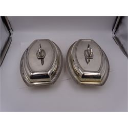 Pair of 1930s silver serving dishes with covers, each with removable handles, hallmarked Barker Brothers Silver Ltd, Birmingham 1935, L27.5cm, H12cm