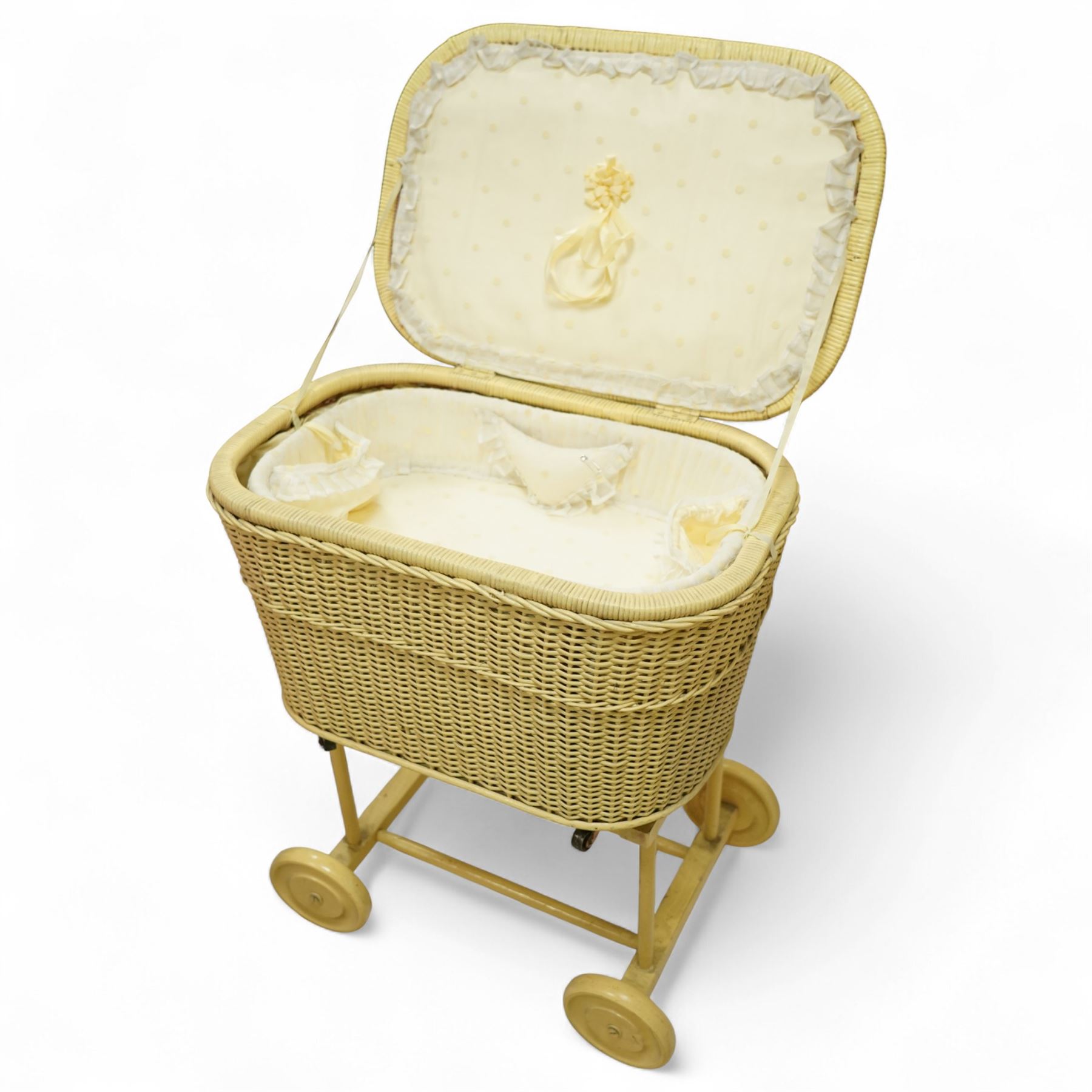 *Mid 20th century nursery set, comprising a cream painted metal cot with adjustable base, a wicker baby basket on wheeled stand, and a folding nursery screen with printed fabric panels decorated with playful animal and teddy bear motifs

Cot (H 112cm, W 136cm, D 77cm)
Screen (H 139cm, W 148cm) 
Basket (H 72cm, W 59cm, D 40cm)From the Kirkham Hall Attic & Cellar Collection, sold without reserve