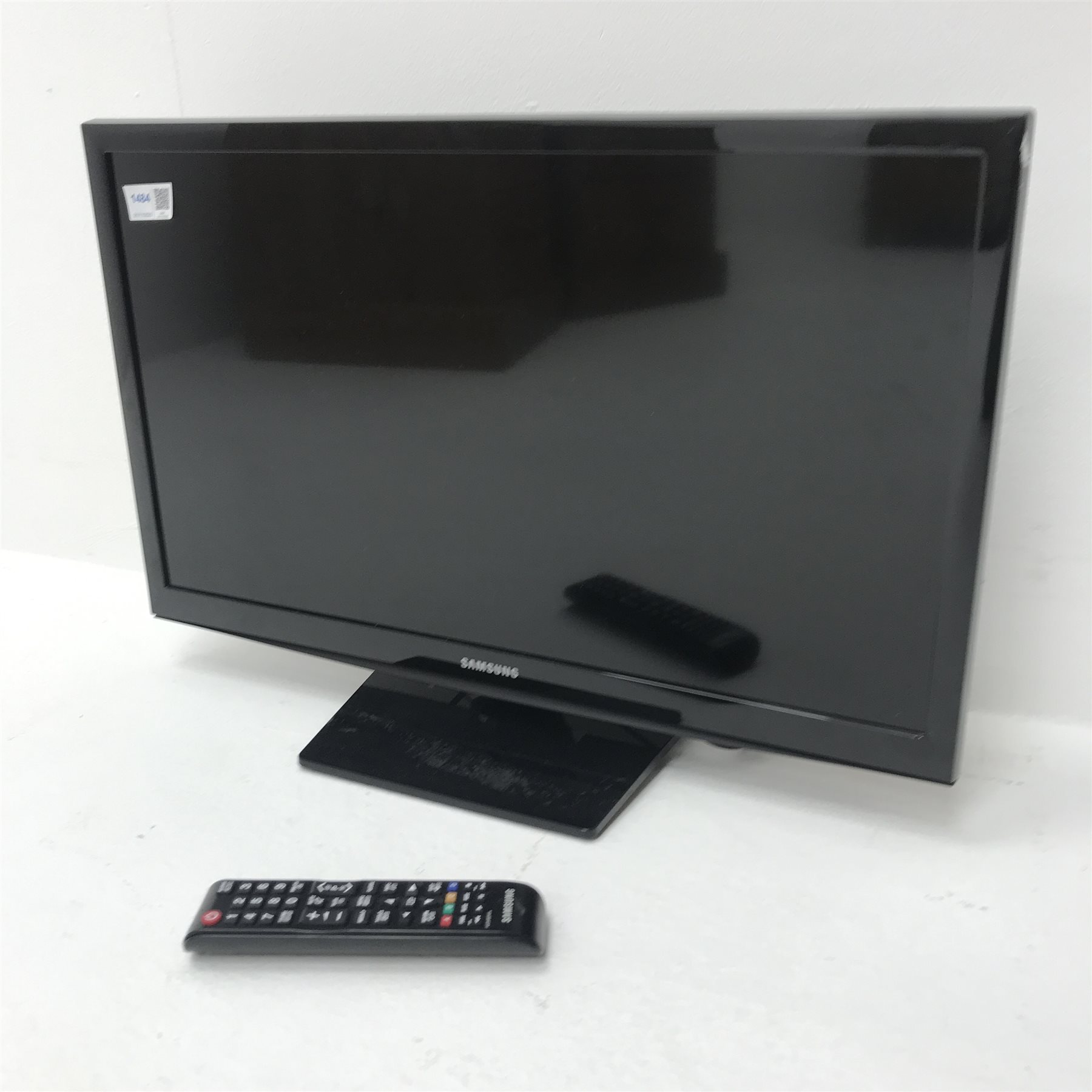 Small Samsung UE24H4003AW (24") television with remote control The Furnishings Sale