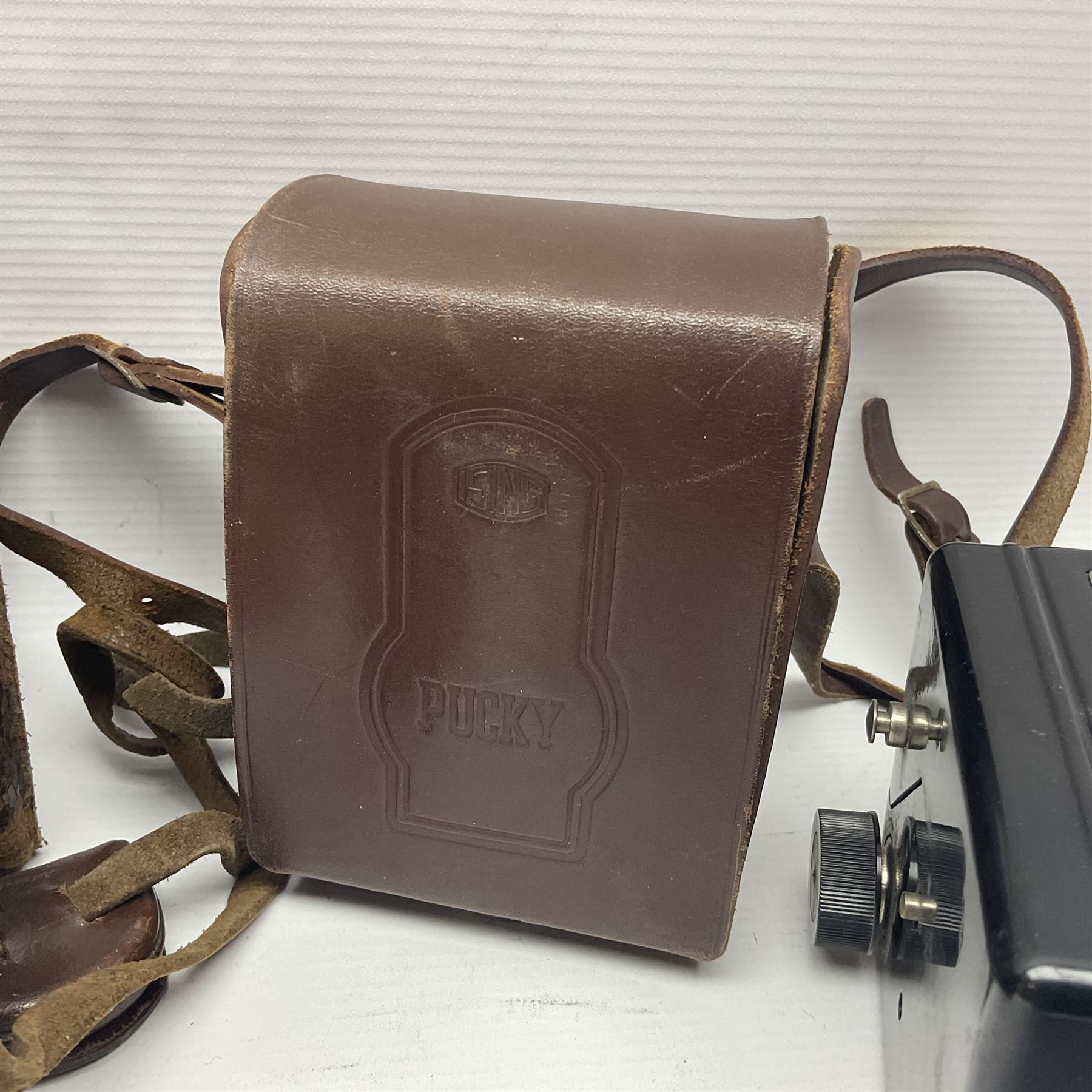 Franke & Heidecke Rolleicord twin lens camera, serial number 012706 with Heidoscop-Anastigmat f=7.5cm' lens and a 'Carl Zeiss Jena Triotar 1:4.5 f=7.5cm' lens, serial no 1474898, together with three similar cameras, including SEM TLR, serial no 420218, Ising Pucky box and Ferrania Elioflex, three in leather carry cases