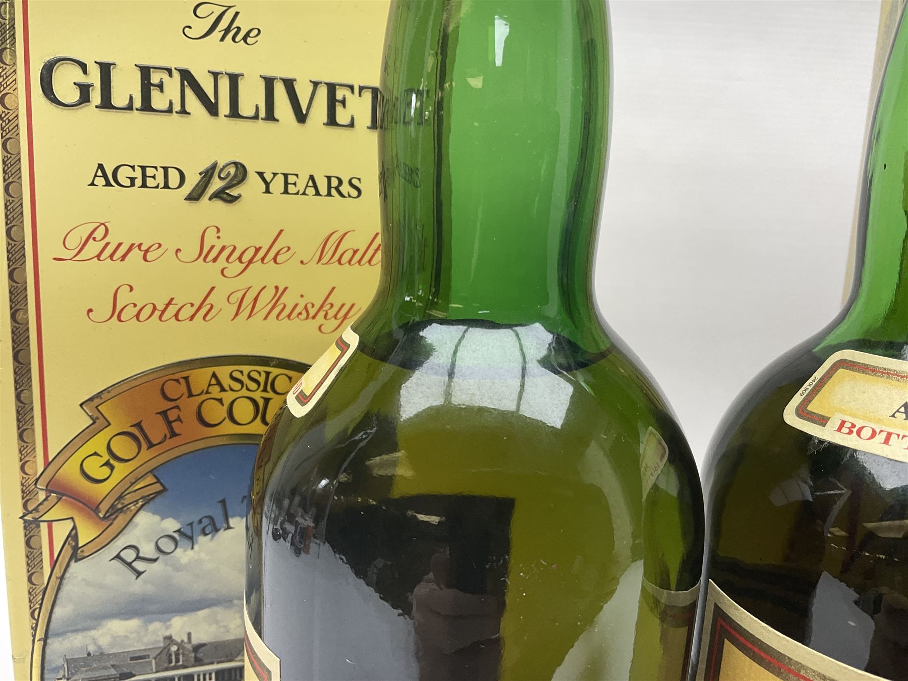 Two Glenlivet 12 year old, single malt Scotch whisky, 700ml 70% vol, each in original Classic Golf Clubs of Scotland presentation tin, Royal Troon and Royal Dornoch
