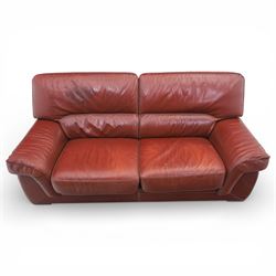 Fabrizio Mantellassi - 20th century Italian red leather suite, one three seat and two large armchairs, upholstered in deep red hide with stitched seam detailing, with magazine pockets to each side, the rectangular back cushions above broad padded arms and seat cushions, raised on low block bases

Sofa: H c98m, W 203cm, D 92cm
Armchair: H 98cm, W 113cm, D 92cm