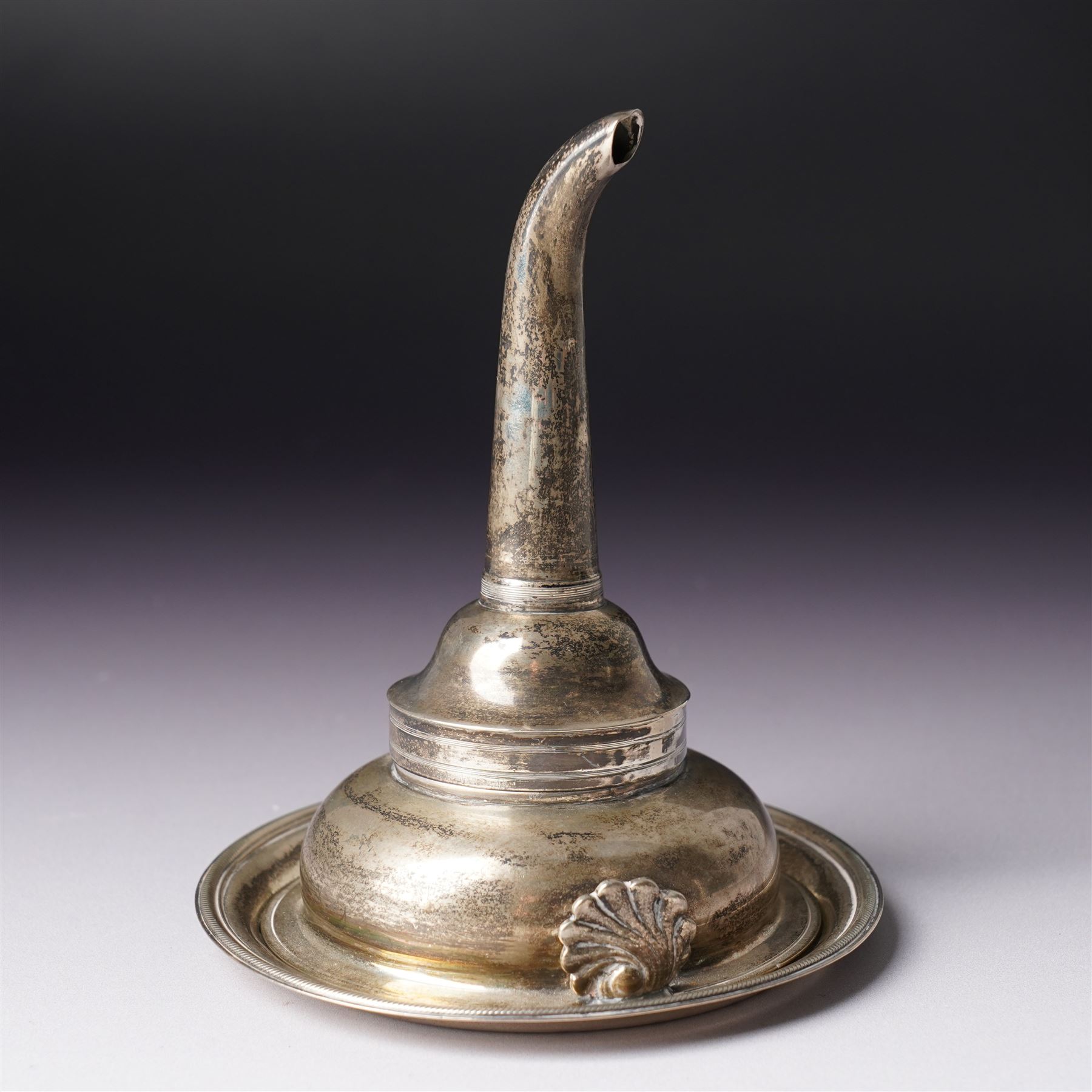 Early 19th century silver wine funnel with small circular stand engraved with a crest, makers mark on stand PG