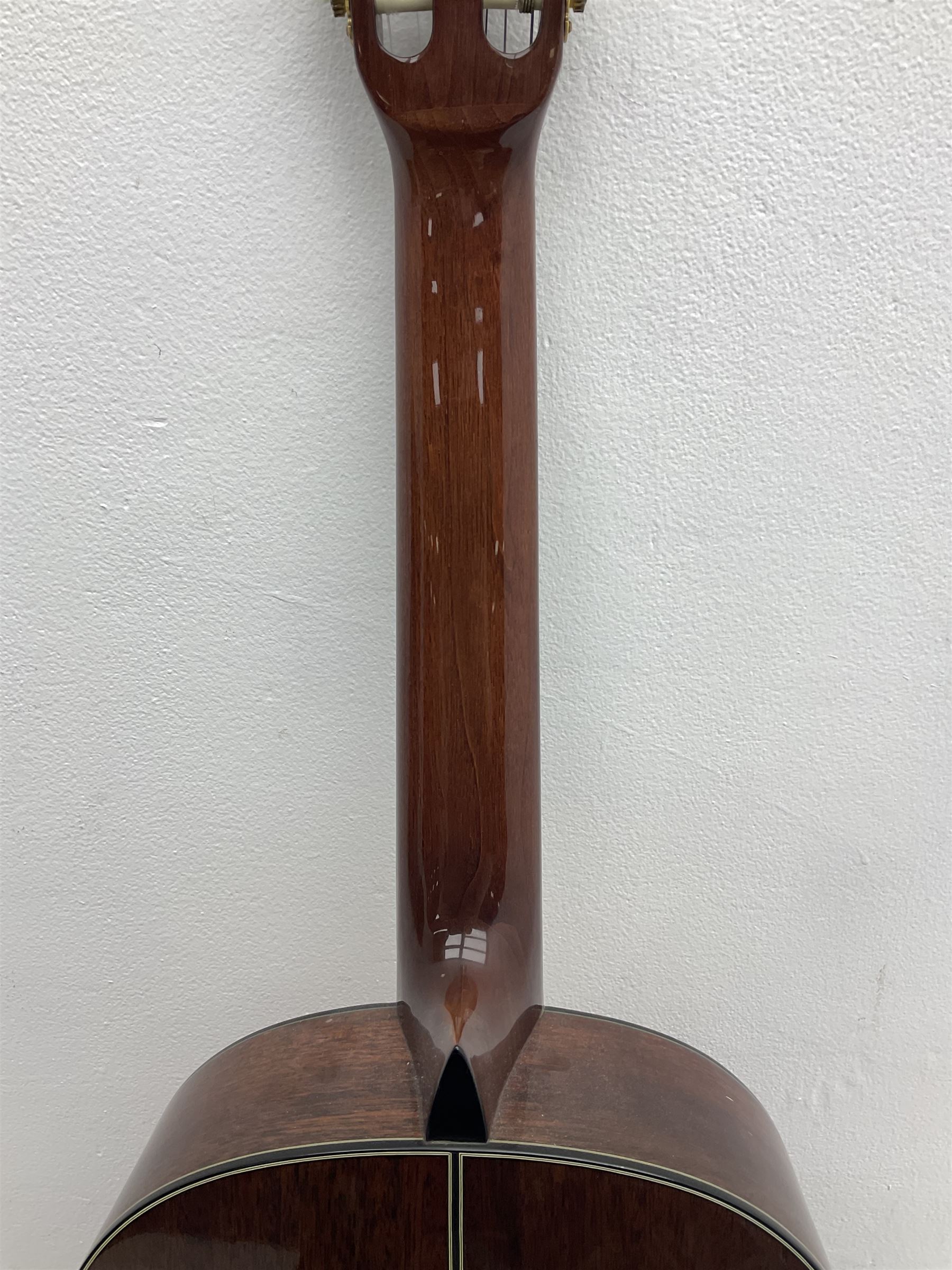 Nagoya Suzuki Model SC240 acoustic guitar with mahogany back and ribs and spruce top, bears label, L101cm; in soft carrying case