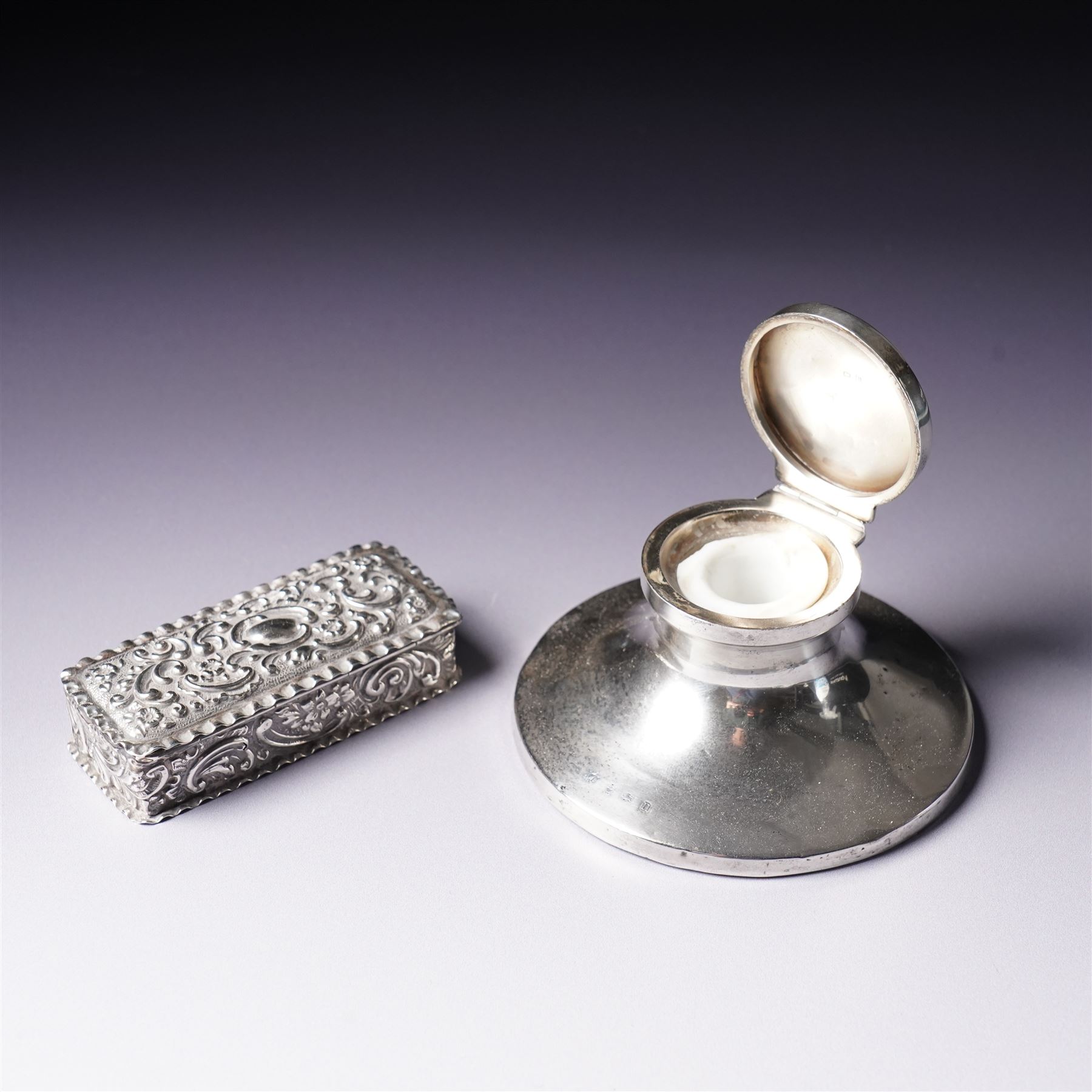 Pair of small silver vases H8cm London 1912, silver circular inkwell Birmingham 1912, cased set of six silver coffee spoons and a small silver dressing table box