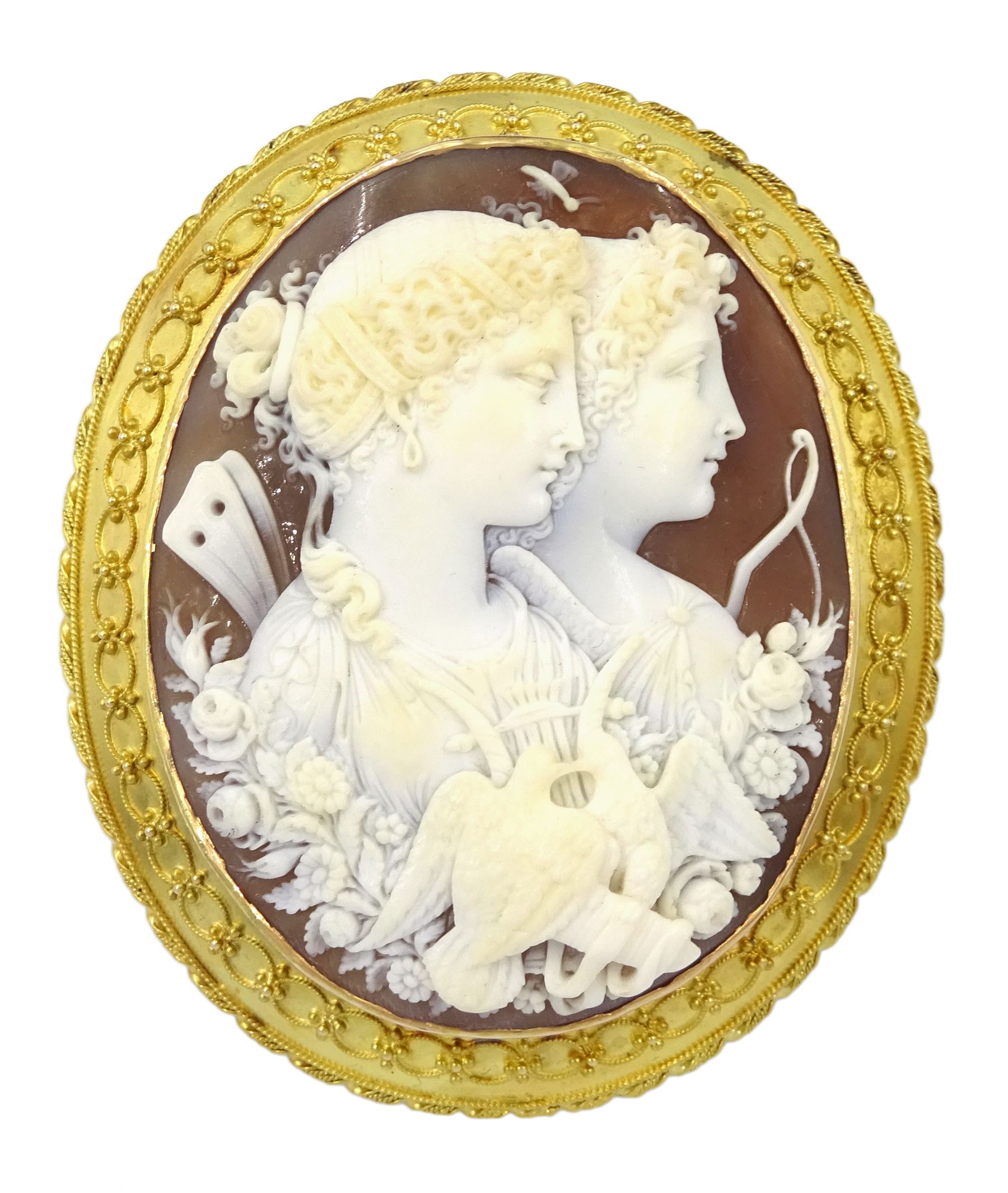 Victorian fine cameo brooch depicting Cupid and Psyche, in 18ct gold Etruscan Revival gold wirework mount, the reverse indistinctly signed Lamary, in original fitted silk and velvet lined case