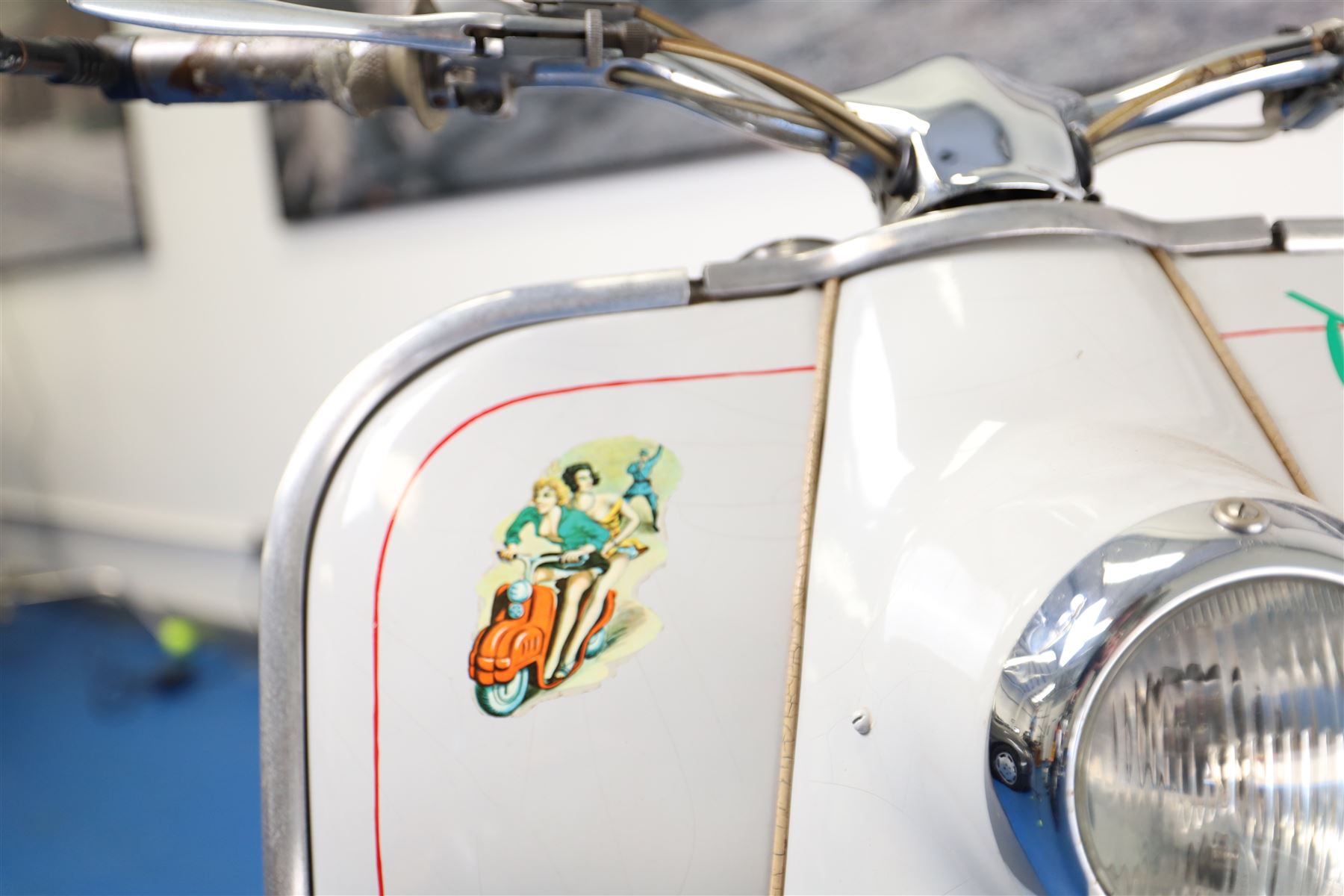 1957 Zündapp Bella R154 Scooter

• Registration: 150 KPU
• Year: 1957
• Model: Bella R154
• Engine: 150cc two-stroke single-cylinder petrol
• Transmission: Four-speed manual
• Odometer reading: 1,727 miles
• Colour: Ivory
• Seating: Dual seat
• V5C: Present
• Original registration book: Present
• Keys: 1

A characterful 1957 Zündapp Bella R154 scooter, finished in ivory with a contrasting brown dual seat and displaying an odometer reading of 1,727 miles.

The Bella R154 formed part of Zündapp’s distinctive range of German touring scooters, combining a 150cc air-cooled two-stroke engine with four-speed transmission, large wheels and substantial pressed-steel bodywork. This example retains its enclosed front apron, central headlamp, chrome handlebars, brightwork, period VDO speedometer and decorative Bella badging.

An operation and maintenance manual is include and accompanied by its V5C and original registration book from 1957.

This vehicle forms part of the Estate of the Late John Sills and is offered for sale by the Executors, confirming a genuine reason for sale.