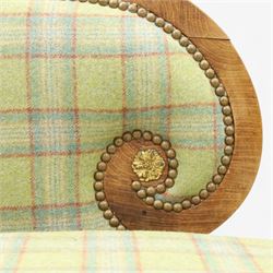  19th century scumbled oak chaise longue upholstered in tartan fabric, swept frame with gilt mounts, studded border with loose base cushion, raised on turned bobbin supports terminating brass castors