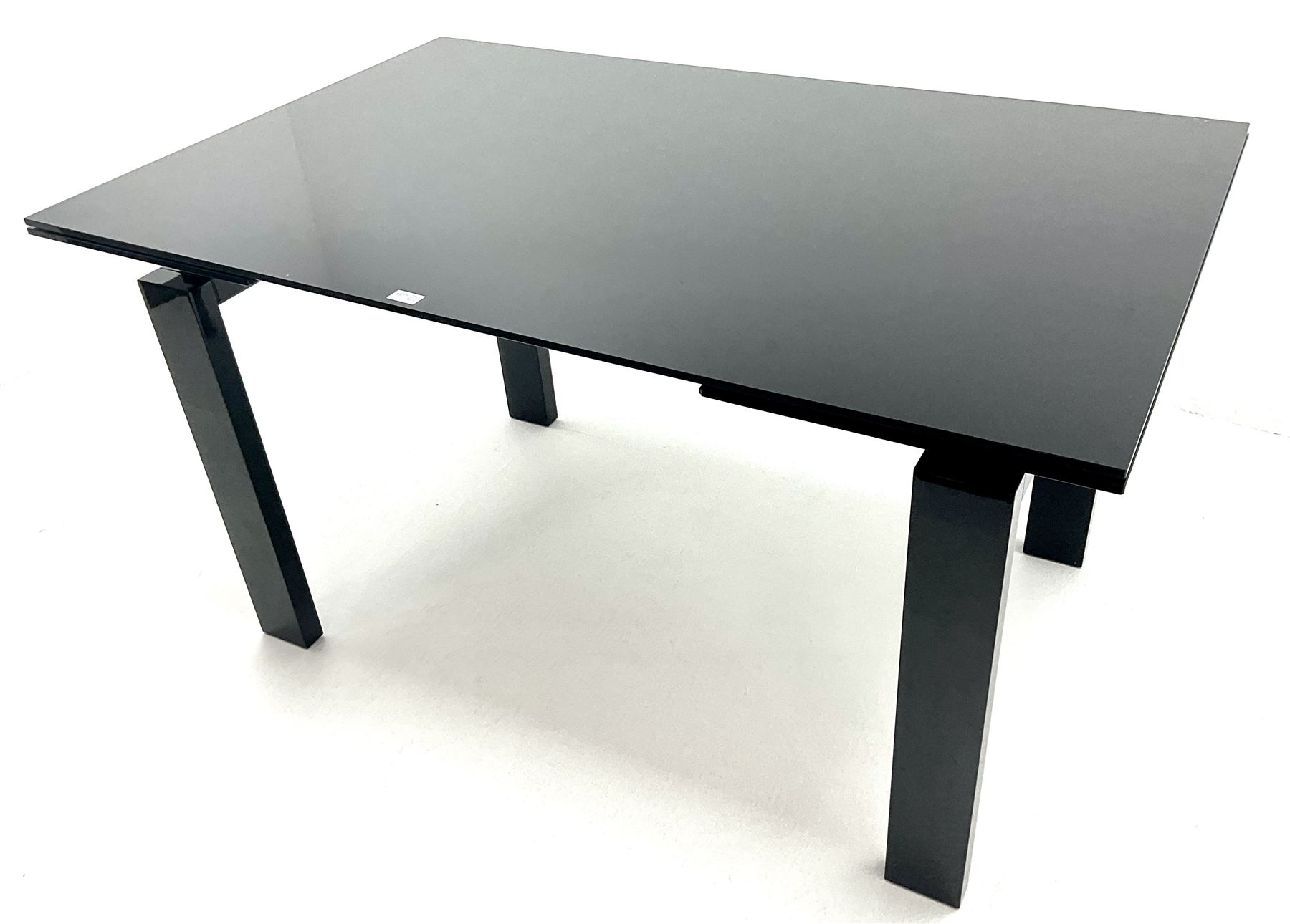 Ponsfords Sheffield Italian black gloss and glass extending dining table, rectangular supports (W220cm & 140cm, H77cm, D90cm) and set six chairs black and white dining chairs (W48cm)