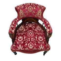 Edwardian inlaid rosewood salon suite, upholstered in red and gold fabric, comprising two seat sofa, pair of tub shaped armchairs, and four side chairs