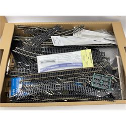 '00' gauge - large quantity of track by Peco, Hornby etc including various straight lengths and curves, points, Tracksettas etc; some still in packaging; in two boxes
