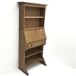 Early 20th century oak secretaire bookcase, projecting cornice above single shelf, fall front, single drawer, shaped solid end supports on sledge feet, W78cm, H166cm, D38cm