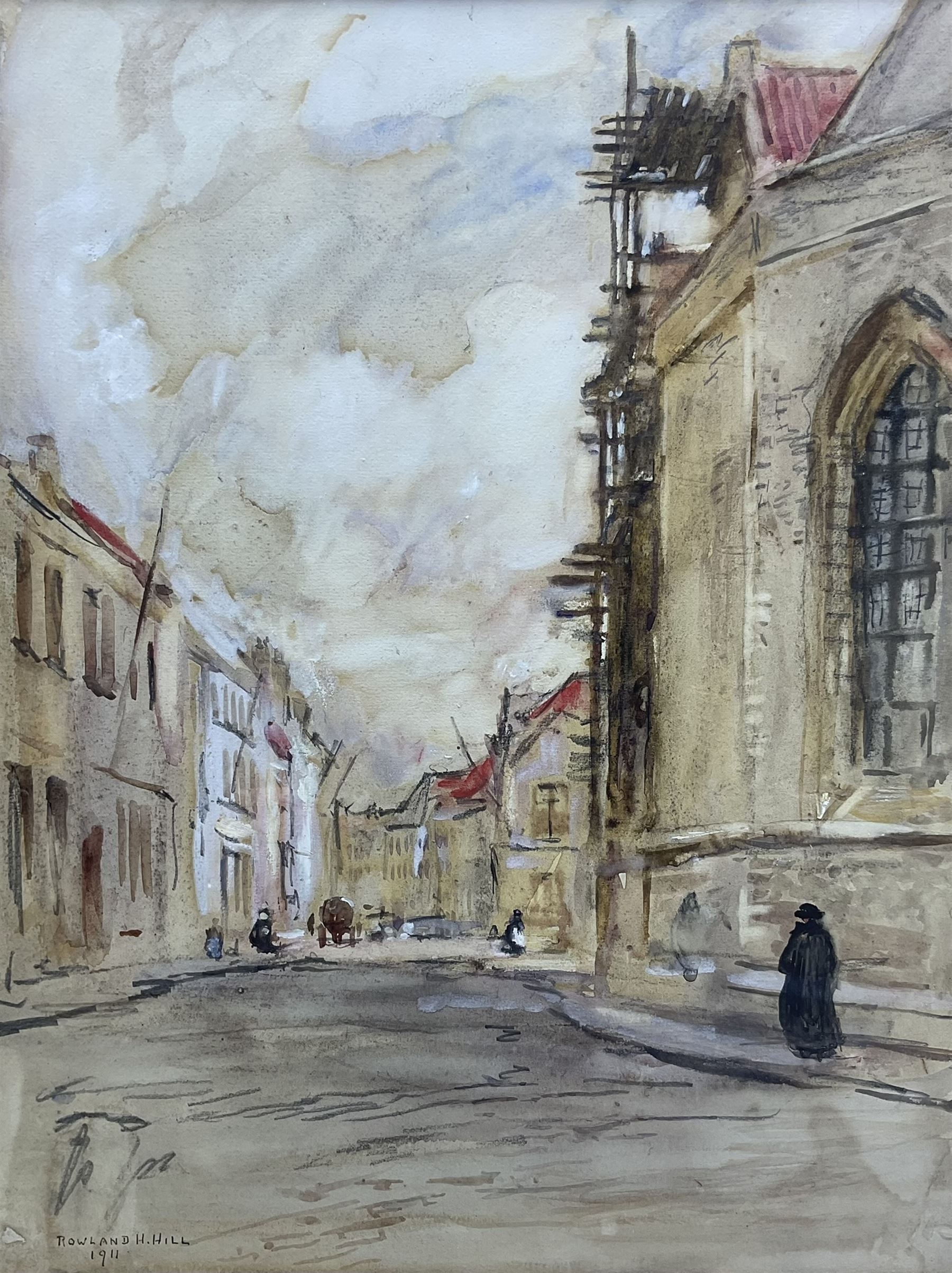 Rowland Henry Hill (Staithes Group 1873-1952): 'A Street Scene - Bruges', watercolour heightened in white signed and dated 1911, original title label verso 47cm x 35cm
