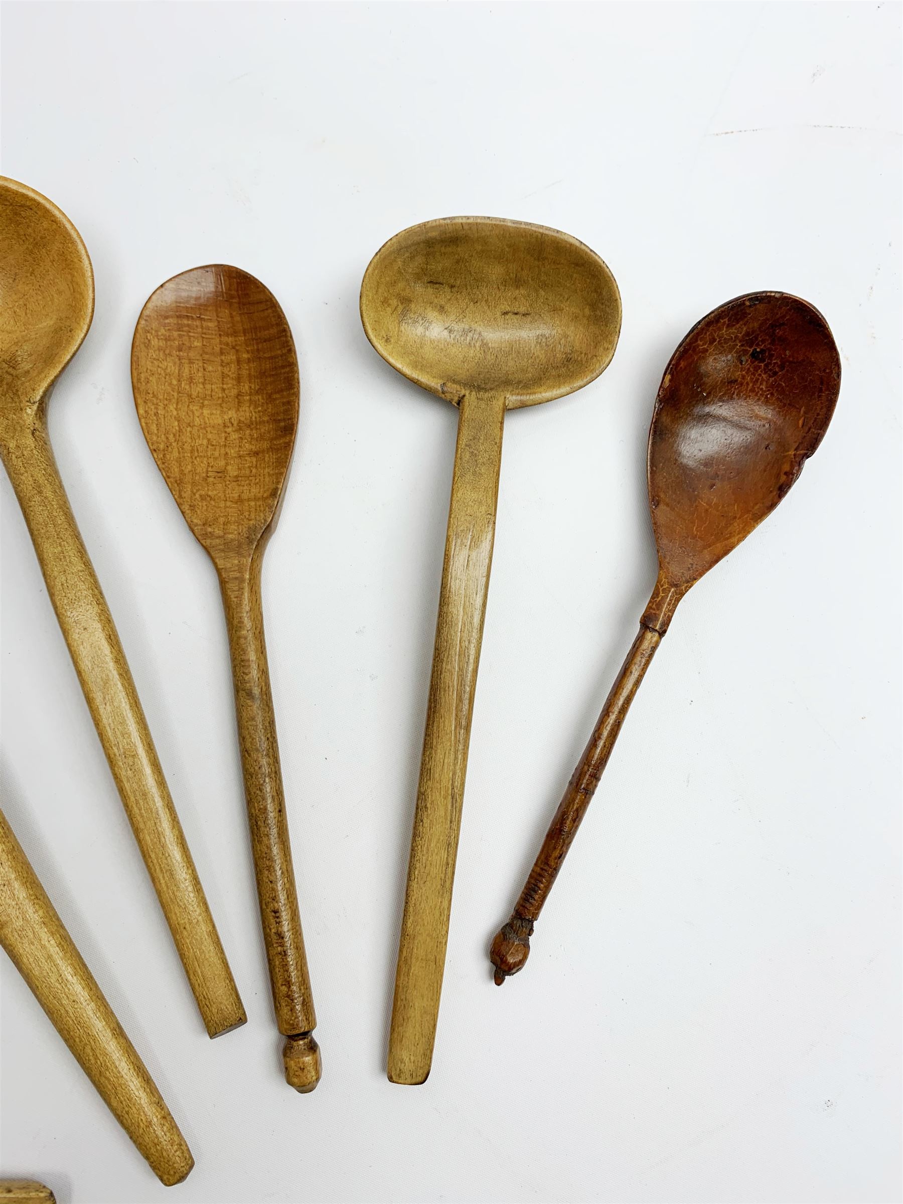 Group of beech and sycamore Welsh Cowl and other spoons, largest example L21.5cm
